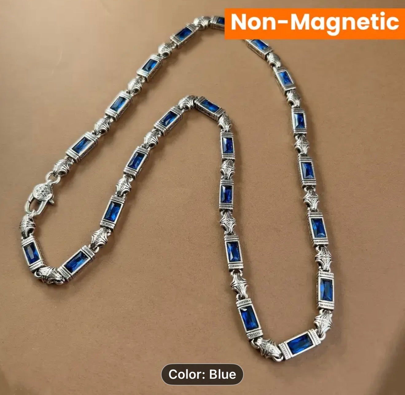 Silver necklace with blue stones, 'Non-Magnetic' and 'Color: Blue'.
