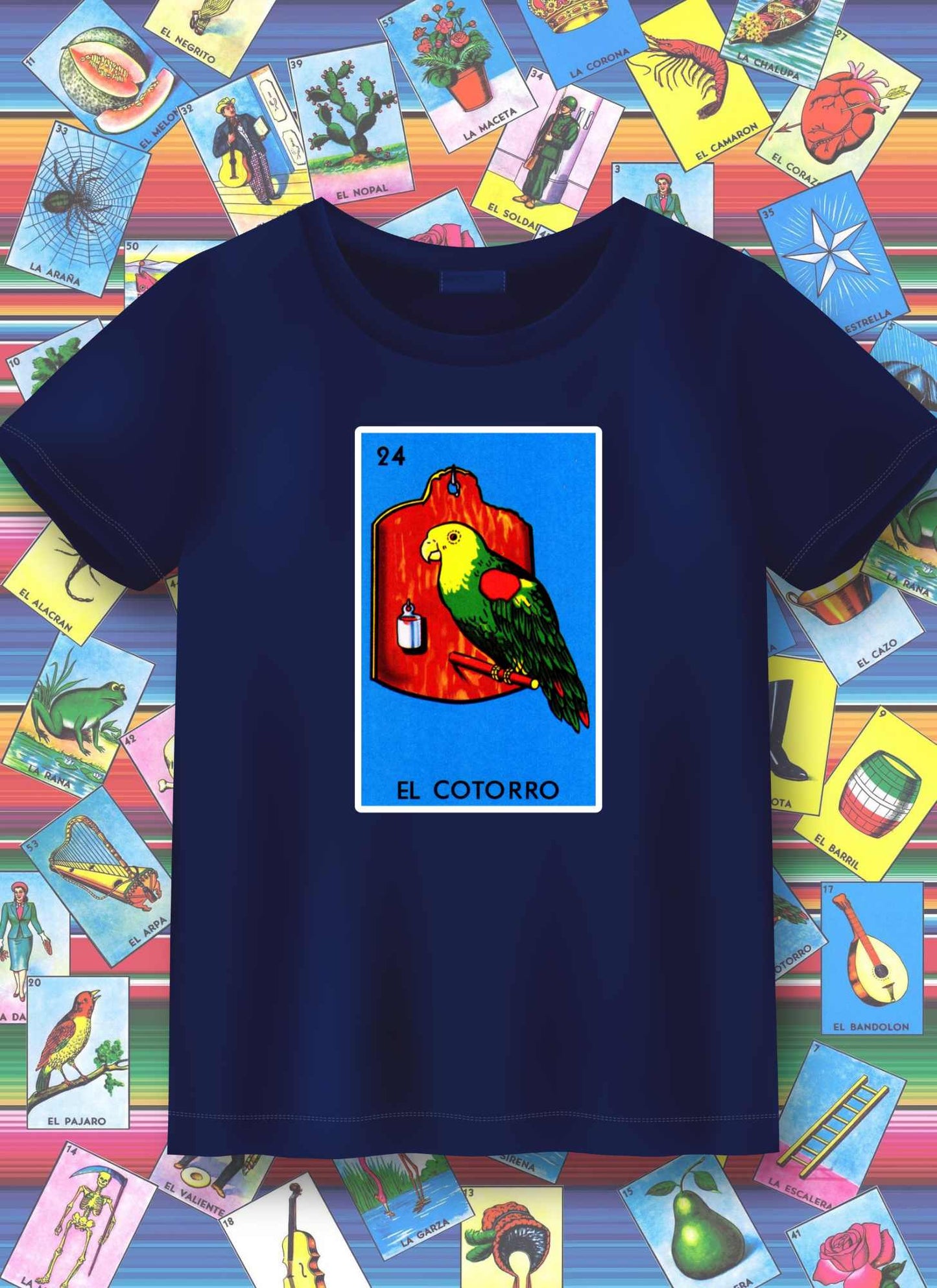 Navy blue t-shirt with 'El Cotorro' design on a colorful background of tarot card illustrations.