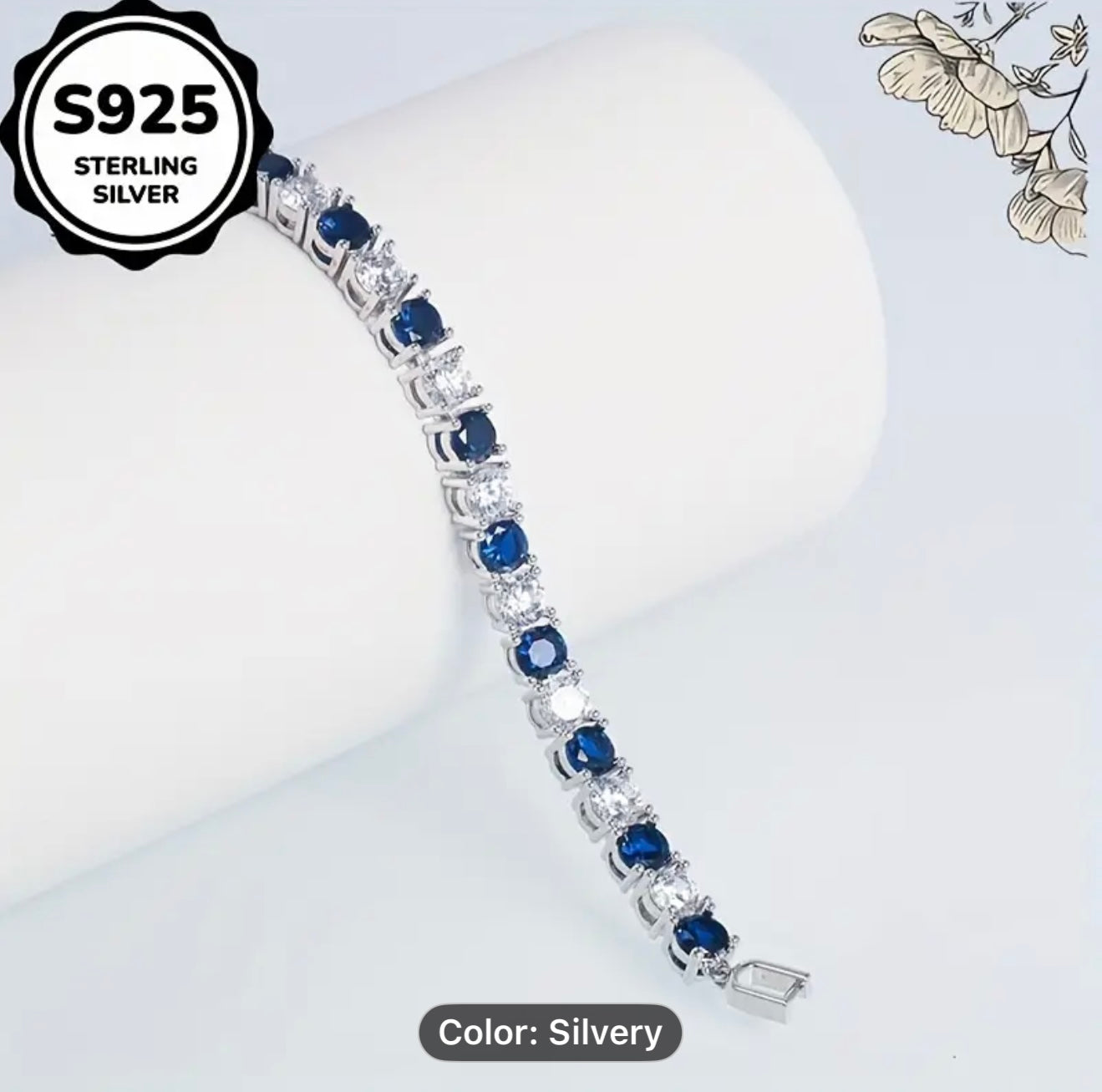 Silver bracelet with blue and white stones
