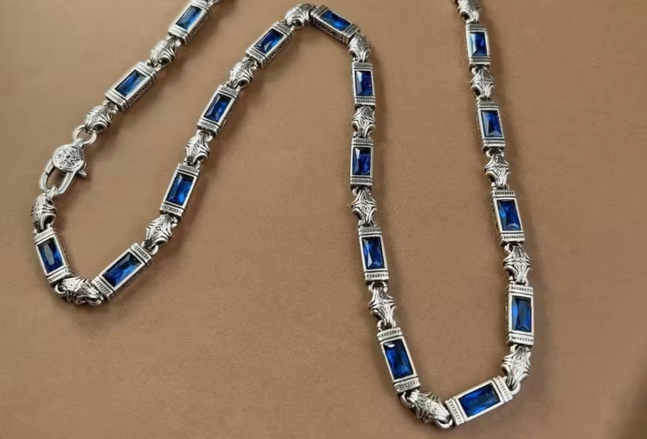 Silver necklace with blue gemstones 